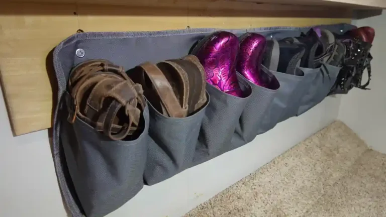 A shoe holder hangs low along a wall