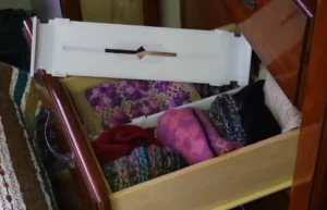 A drawer divider helps separate space in a small drawer